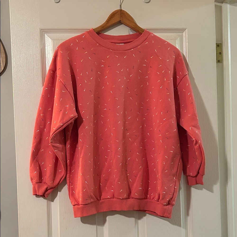 Nike Coral Sweatshirt with Subtle Pattern